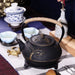 900ml Plum Blossom Cast Iron Teapot with Stainless Steel Infuser
