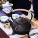 900ml Plum Blossom Cast Iron Teapot with Stainless Steel Infuser