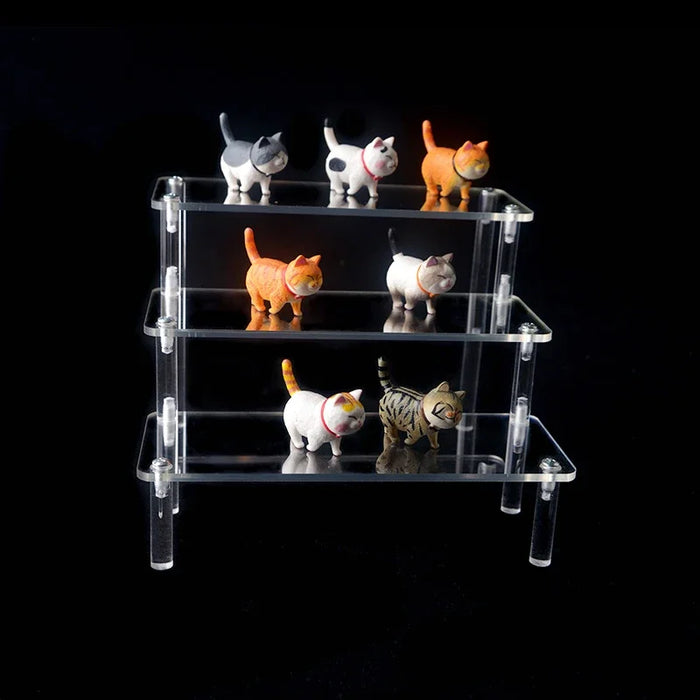 Transparent Acrylic Display Stand — 1–4 Tier Trapezoid Rack for Cupcakes, Perfume & Dolls
