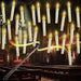 12-Pack Floating LED Taper Candles with Magic Wand Remote — Flameless Flicker Lights