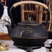 900ml Plum Blossom Cast Iron Teapot with Stainless Steel Infuser